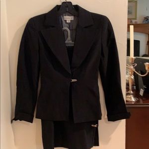 Black fitted suit with metal fastener